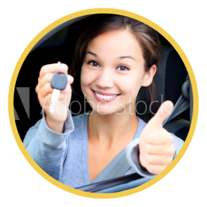 Woman giving a thumbs up holding car keys