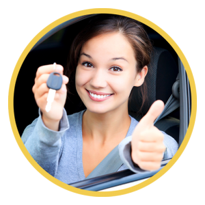 Woman giving thumbs up with car keys