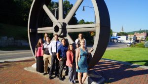 FSB Millennial Team in front of giant wheel in Franklin