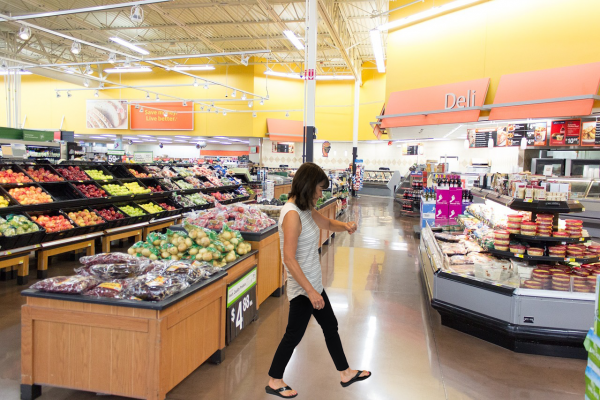 Woman walking in supermarket