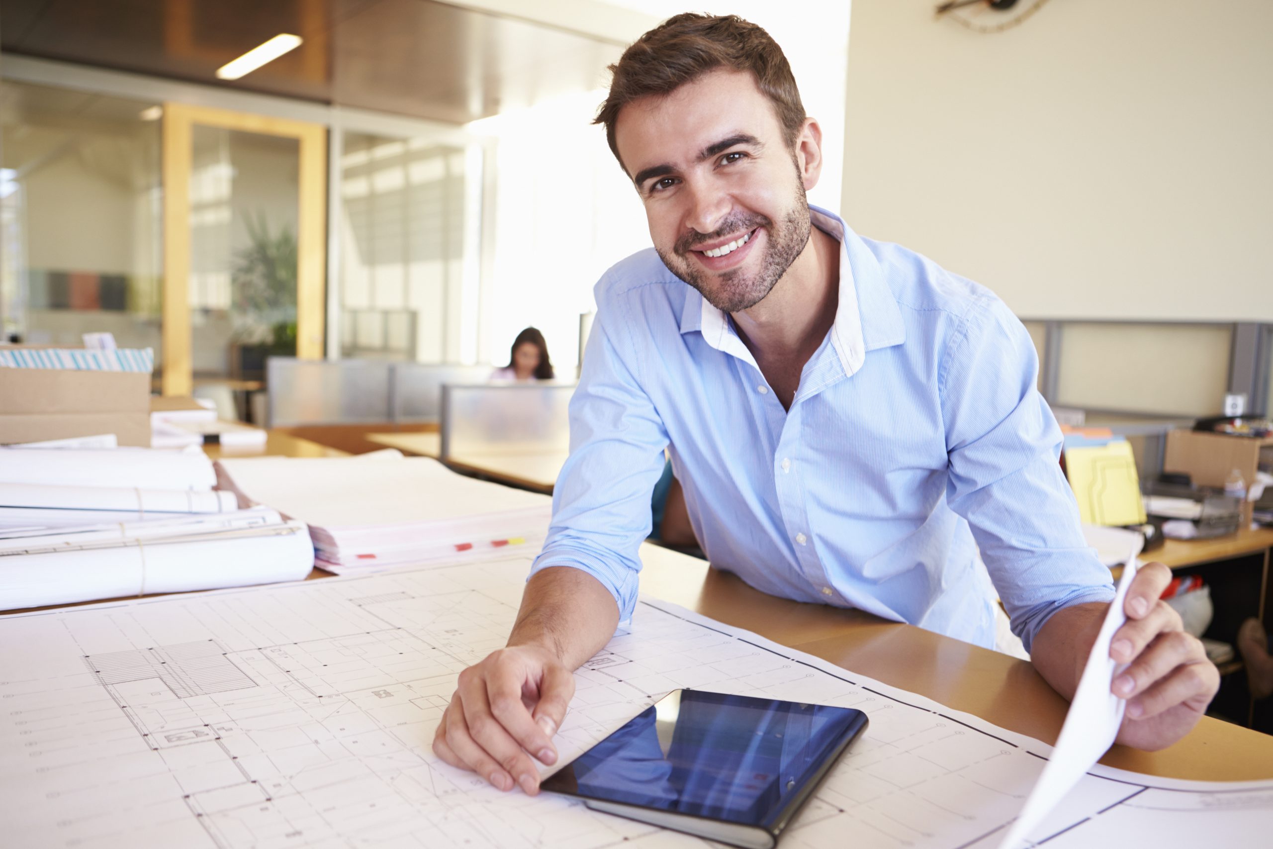 Male architect working with his iPad