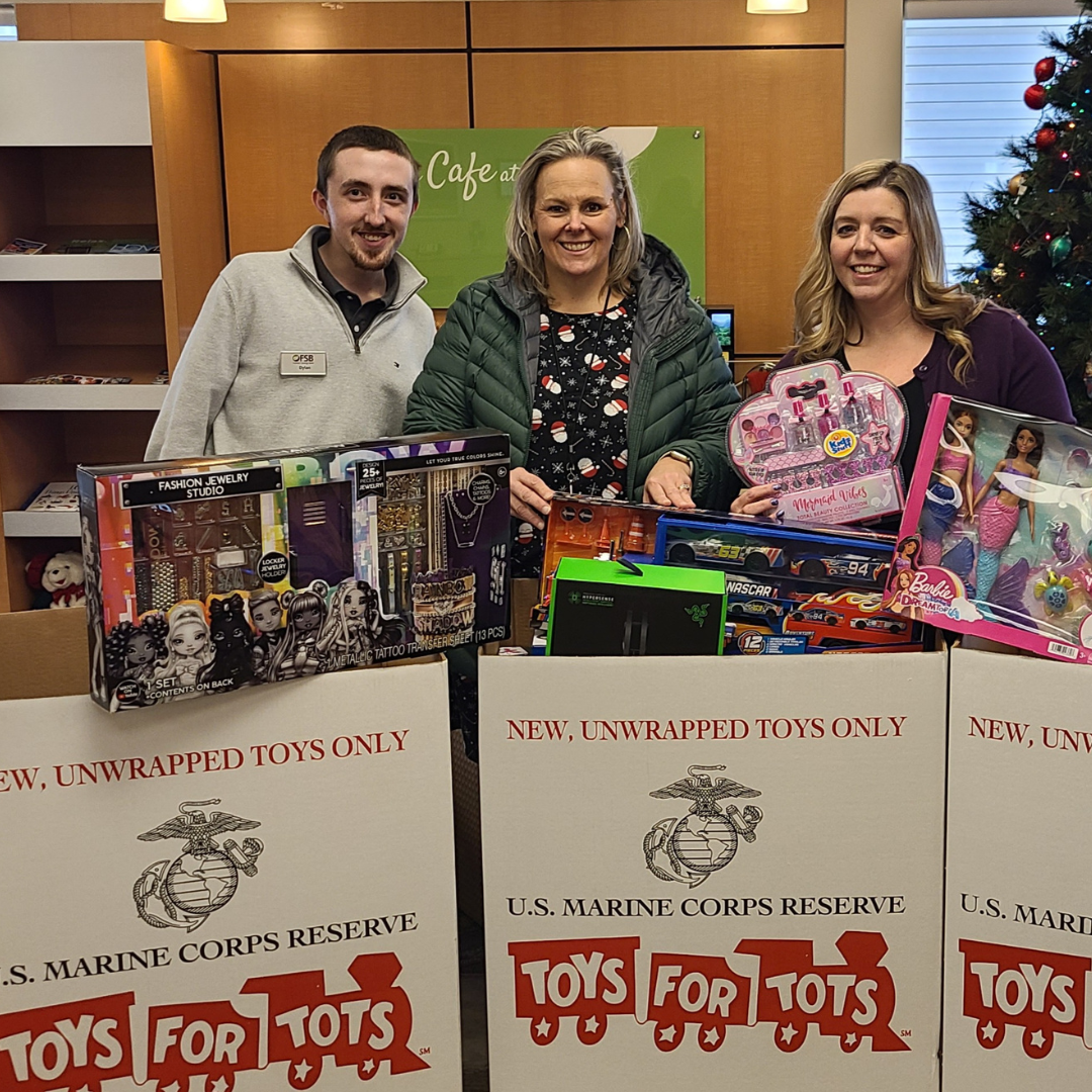 FSB Bristol Team Poises with WMUR Toys for Tots Drive on Pick up Day