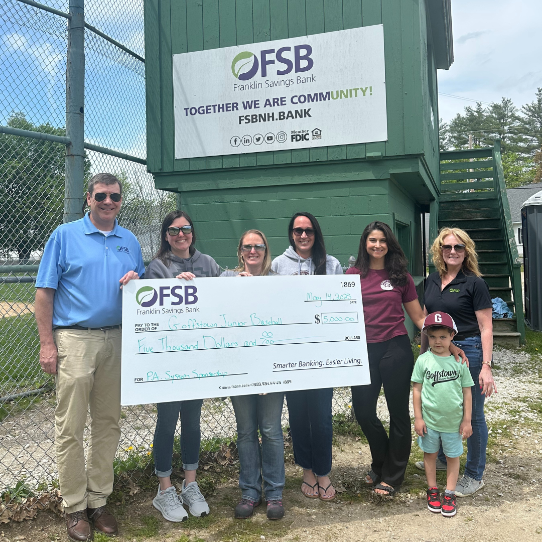 Mike Duval and Heather Capraro from from FSB with the Goffstown Junior Baseball