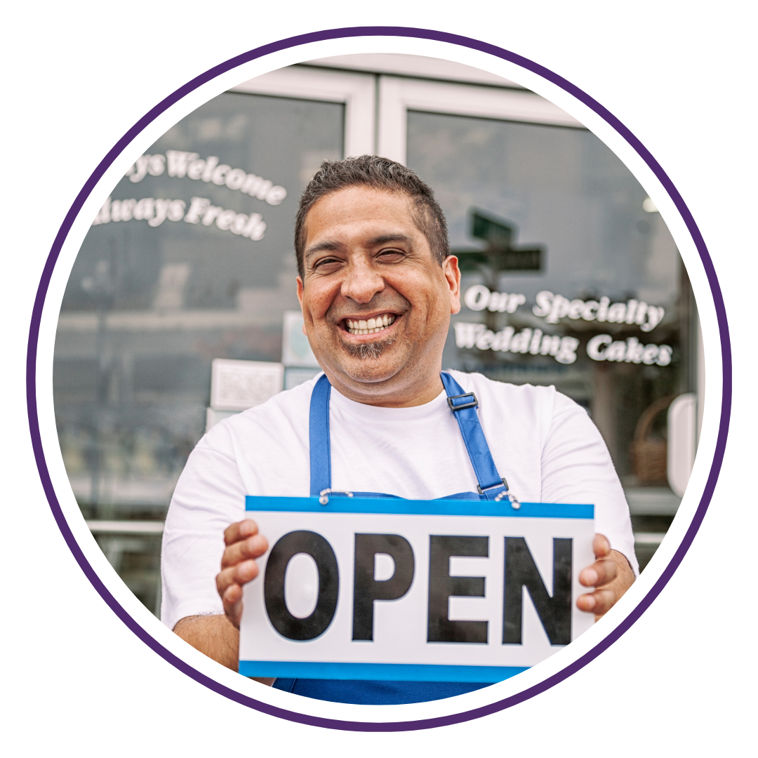 Two men at a construction site, shaking hands. Silhouette
